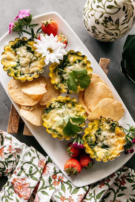 image of the potato chip-crusted quiches on an Easter-themed table spread