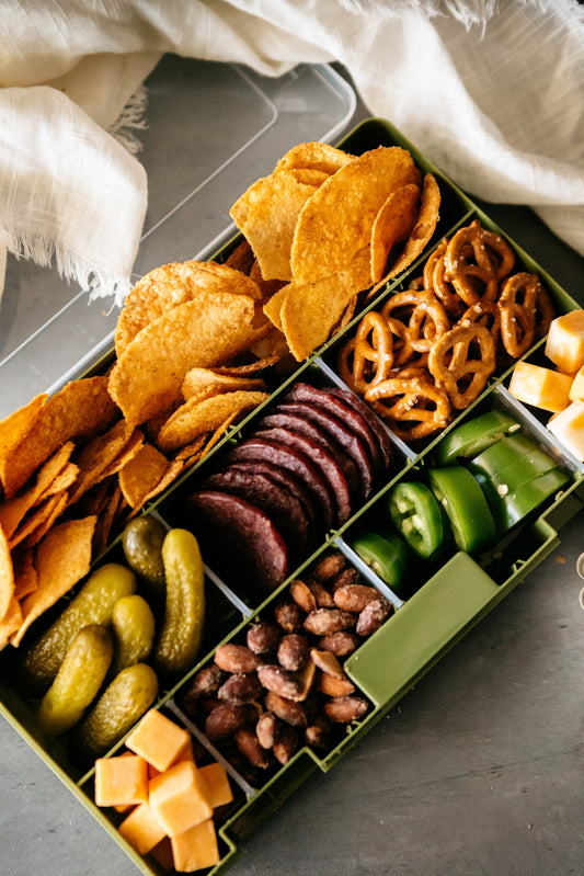 This ultimate Father's Day grazing board combines smoky beef jerky, sharp cheeses, and fresh jalapeños with a generous pile of Vandy Smokehouse BBQ.